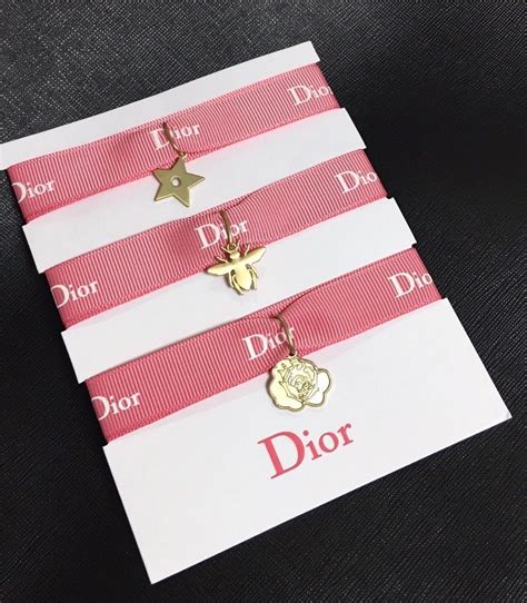 dior white flower bracelet|dior perfumable bracelet.